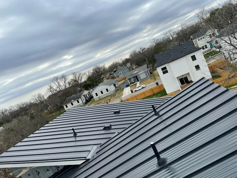 Standing seam metal roof panels with vents for Skylight Repair in Shaker Heights